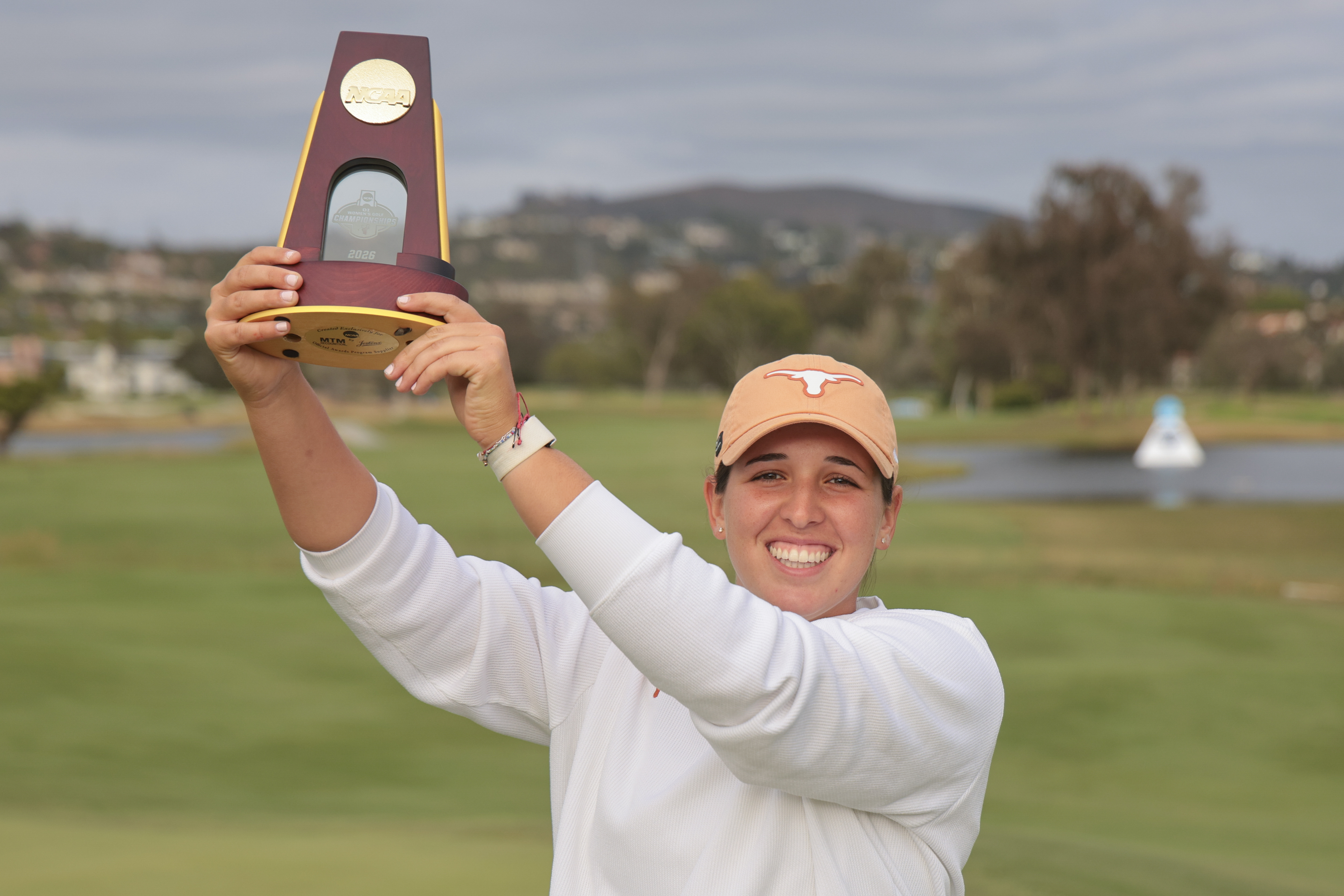 Farah O'Keefe holds the women's NCAA Division 1 trophy