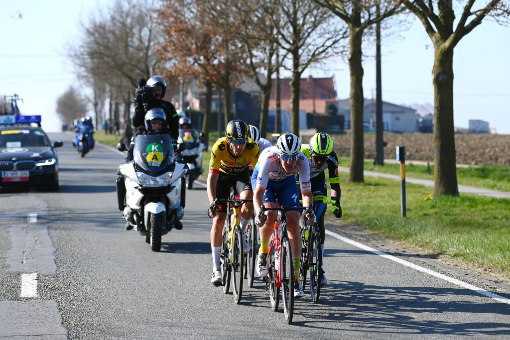 WEVELGEM BELGIUM MARCH 27 Biniam Hailu Girmay of Eritrea and Team Intermarch Wanty Gobert Matriaux Jasper Stuyven of Belgium and Team Trek Segafredo Christophe Laporte of France and Team Jumbo Visma and Dries Van Gestel of Belgium and Team Total Energies compete in the breakaway during the 84th GentWevelgem in Flanders Fields 2022 Mens Elite a 2488km one day race from Ypres to Wevelgem GWE22 WorldTour on March 27 2022 in Wevelgem Belgium Photo by Tim de WaeleGetty Images