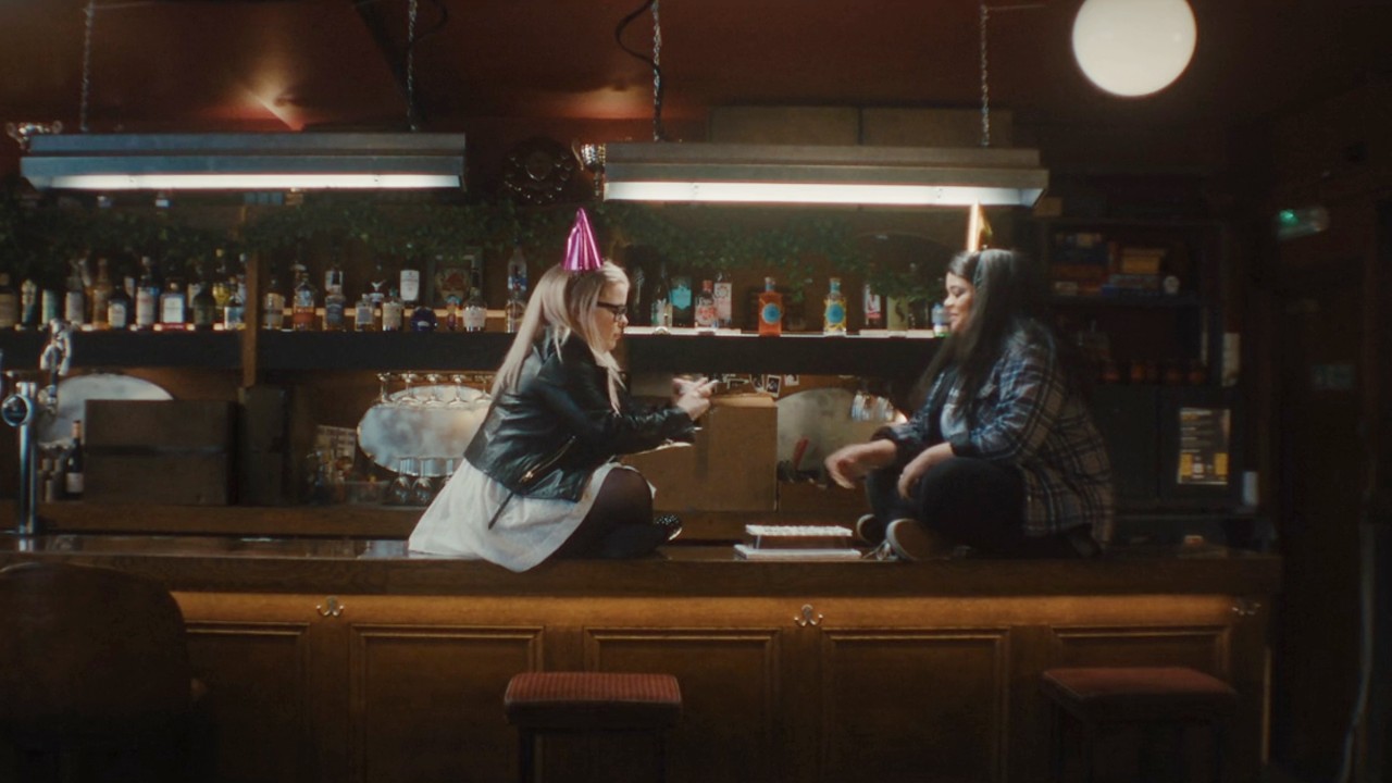 Nicola Coughlan and Lydia West on a bar talking in Big Mood.
