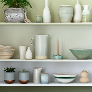 different wall shades with shelves and crockery