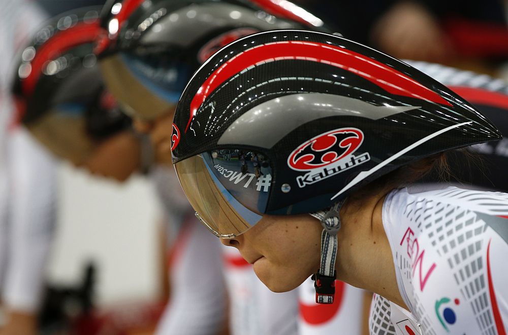 The Japanese women's team pursuiters prepare for the start