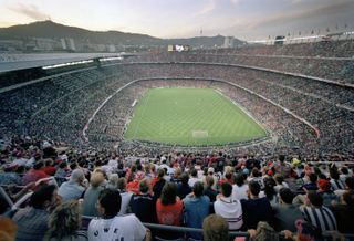 General view of fans from the top of Barcelona's Camp Nou stadium during the 1999 Champions League final between Manchester United and Bayern Munich.