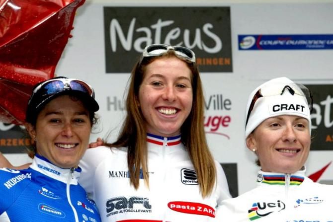 Nicole Cooke on the top step of the podium of the 2005 Fleche Wallonne. Oenone Wood, left, finished second and Judith Arndt, right, placed third.