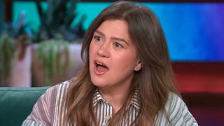 Kelly Clarkson looks surprised during an interview on The Kelly Clarkson Show.