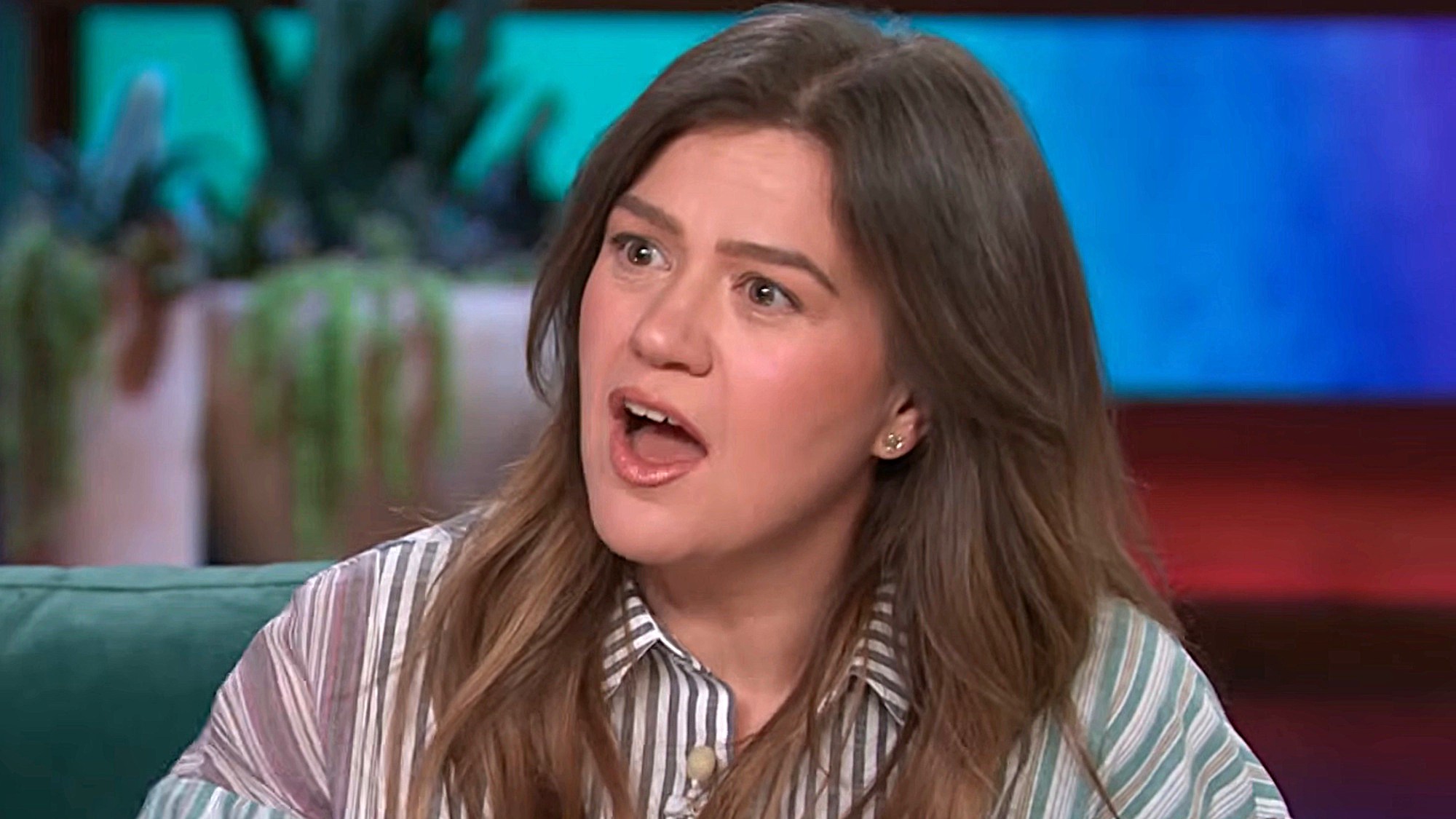 Kelly Clarkson looks surprised during an interview on The Kelly Clarkson Show.