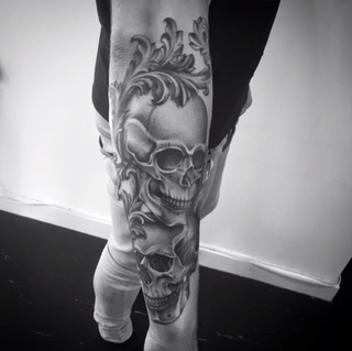 Baroque skull tattoo