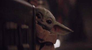 Baby Yoda just steals every single scene he's and he's especially cute and adorable as he hides from the droid Zero.