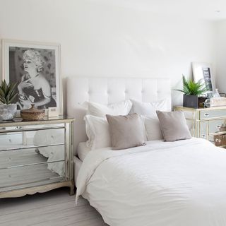 guest room with chest of drawers