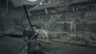 An assassin deflects a projectile with his sword