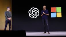 OpenAI CEO Sam Altman (left) alongside pictured Microsoft CEO Satya Nadella on stage at the 2023 OpenAI DevDay.