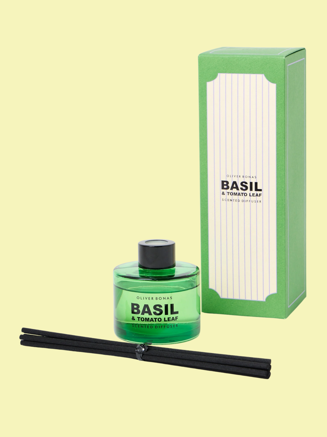 A green Basil &amp;amp; Tomato Leaf reed diffuser from Oliver Bonas