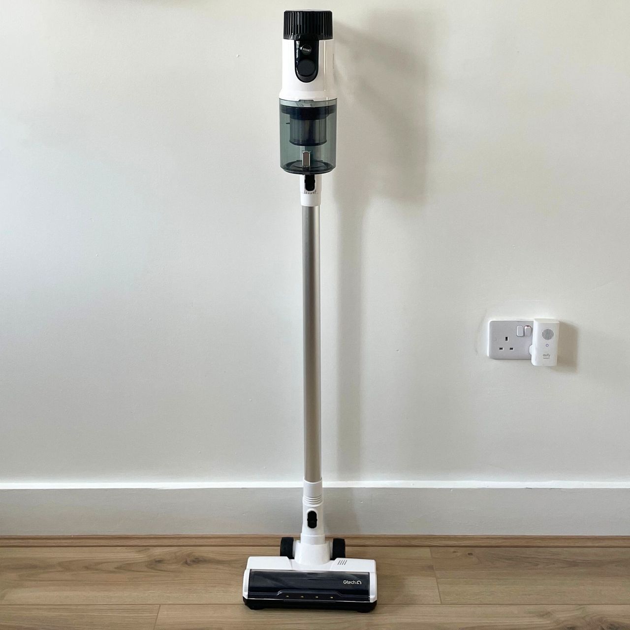 Gtech AirFOX Platinum Cordless Vacuum up against a white wall