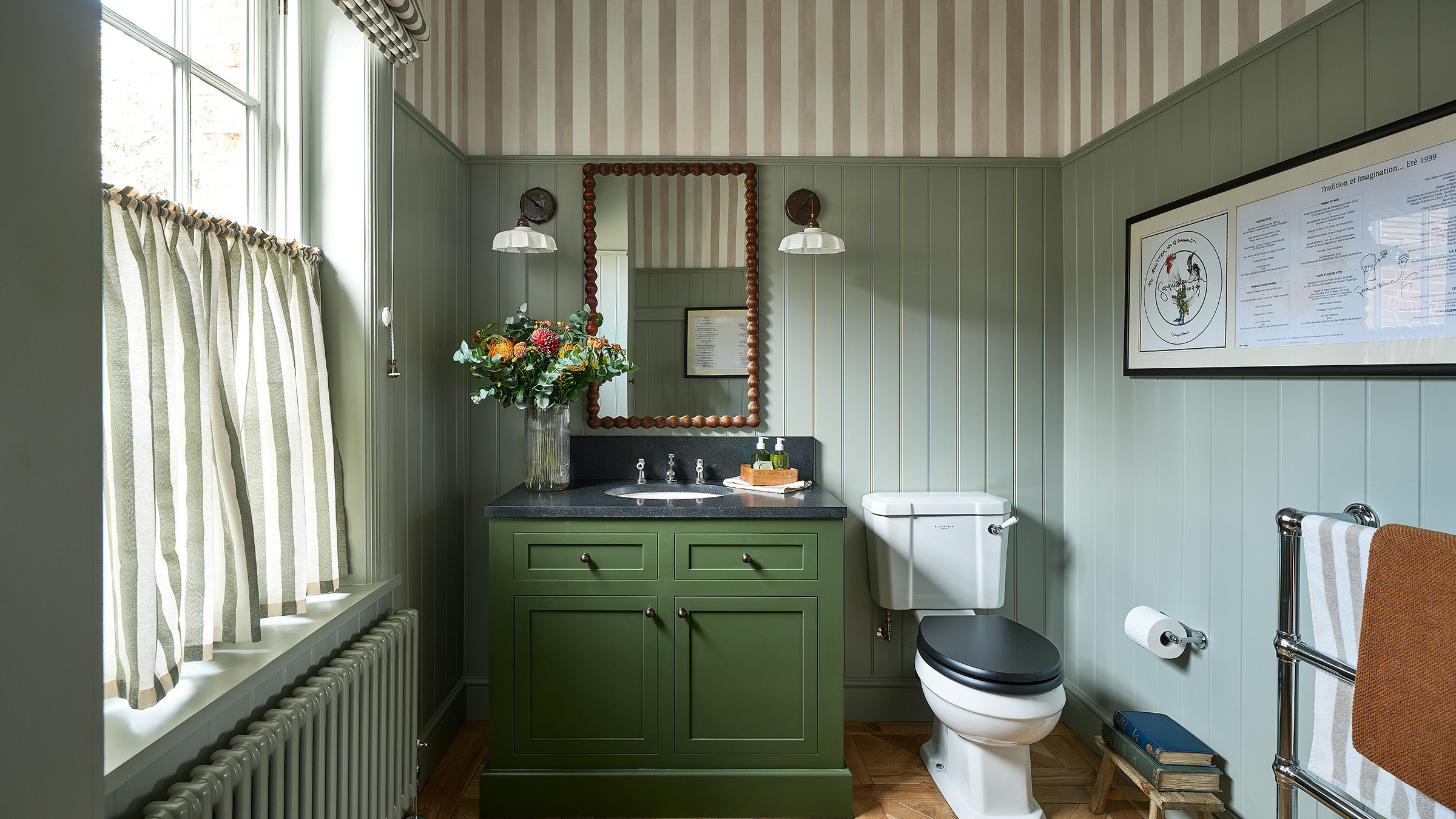 BC designs green bathroom with striped ceiling