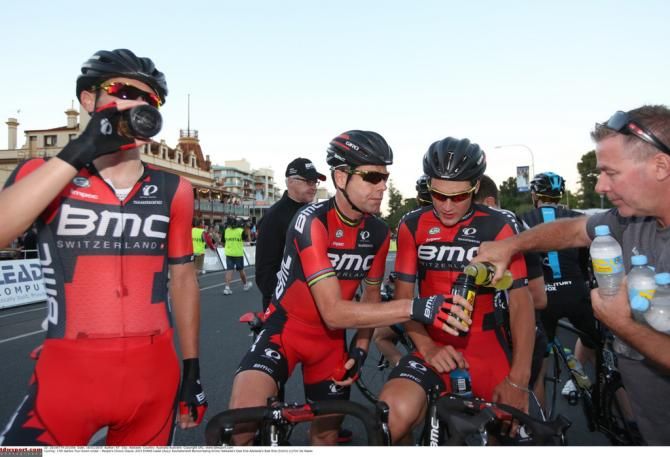 BMC riders grab a drink after the race