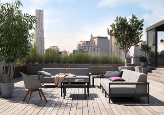 roof terrace with decking and furniture by BoConcept
