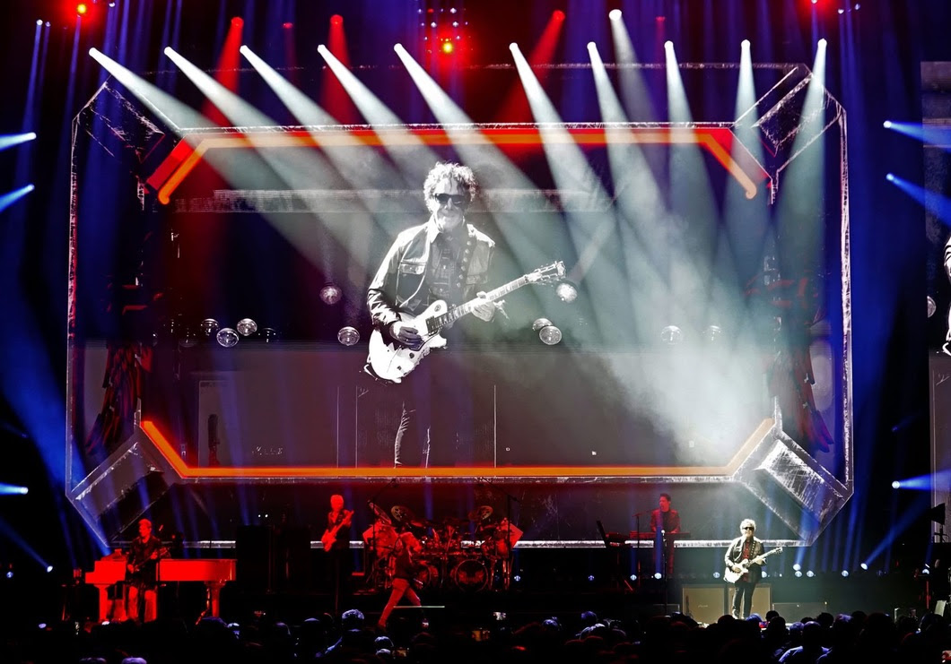 Journey plays on a well-lit stage.