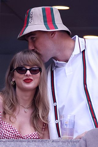 Taylor Swift wears a gingham dress to the US open while travis kelce kisses her on the head