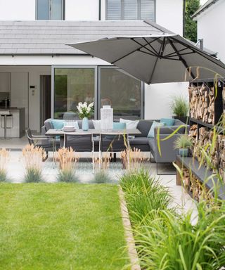 modern outdoor living area with parasol