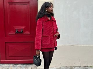 @emmanuellek_ wearing a red Posse quilted velvet outfit.