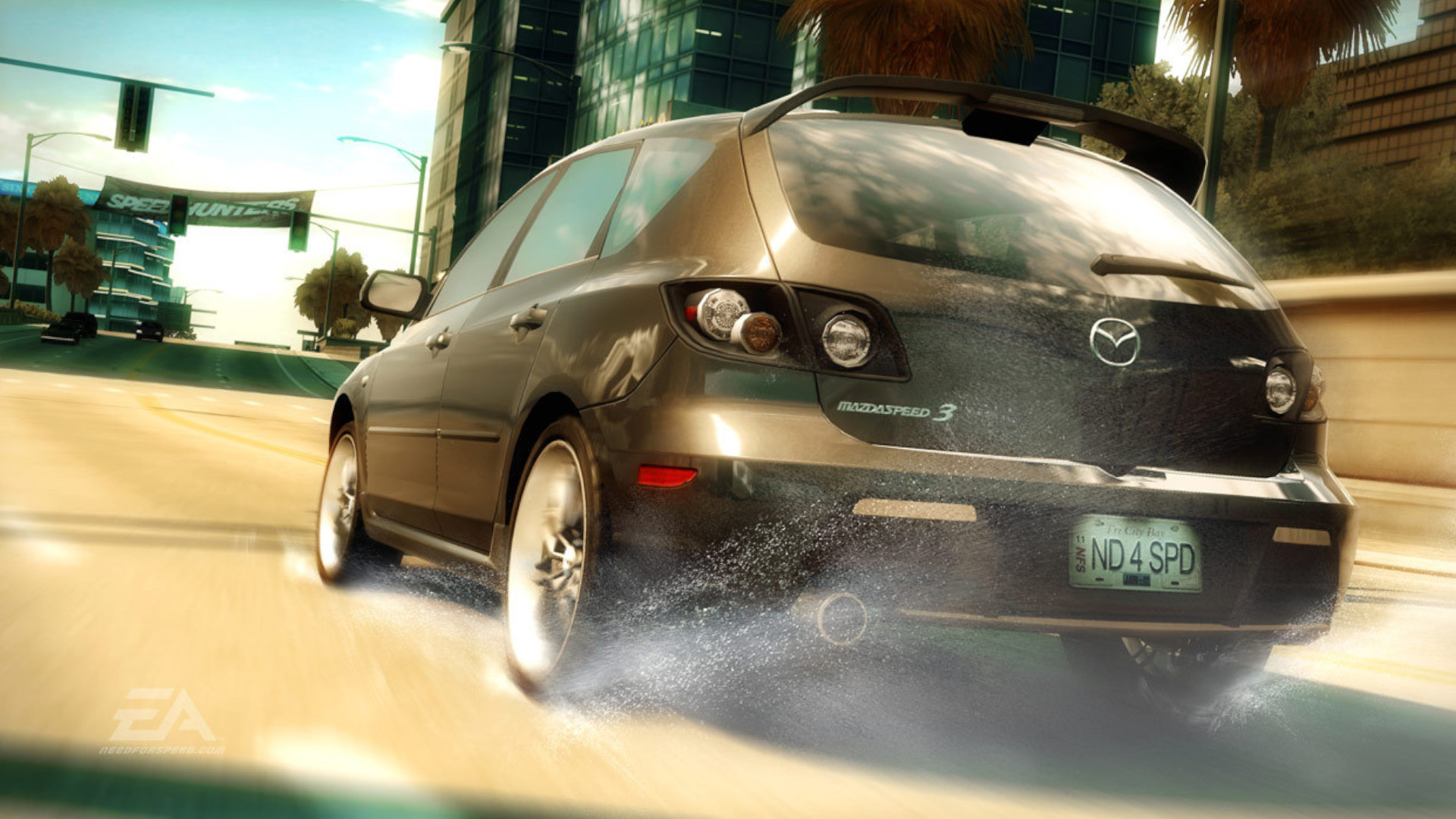 A car racing on a wet road during one of the best Need for Speed games, Need for Speed: Undercover.