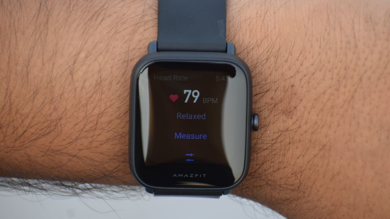 An Amazfit Bip U Pro on someone's wrist