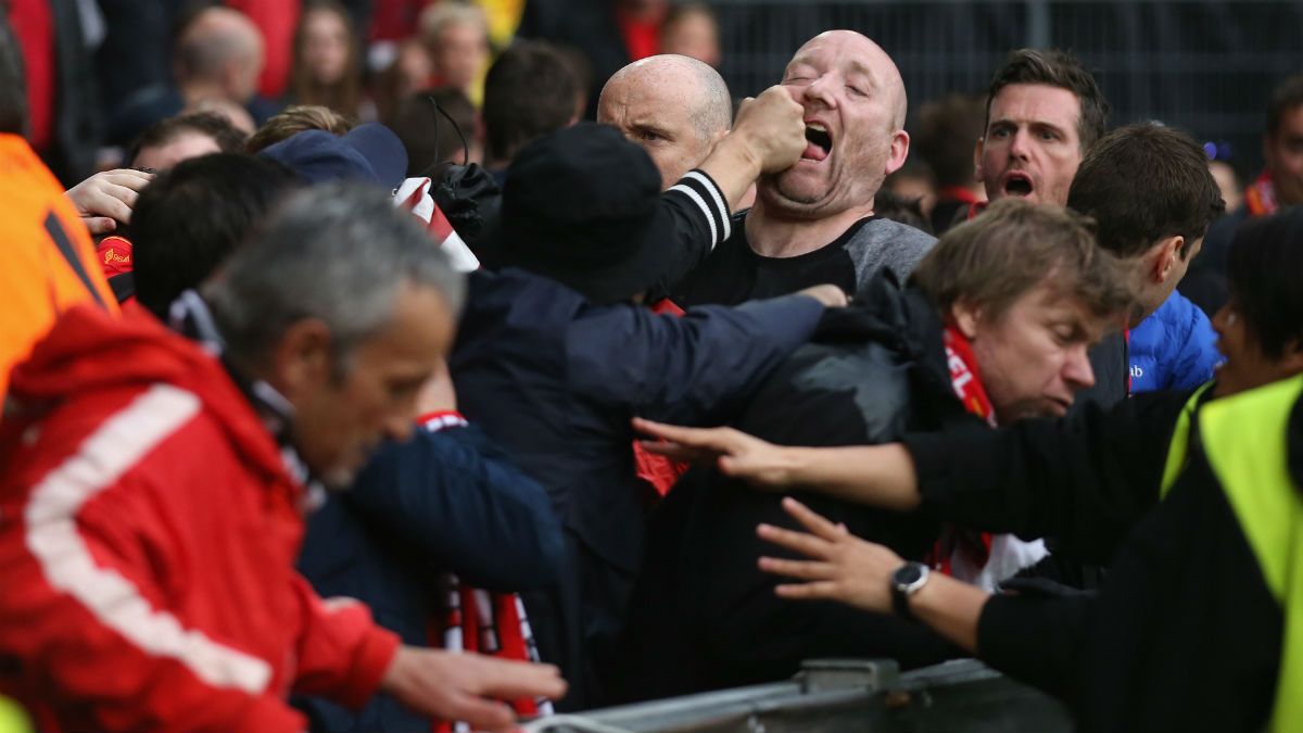 Fans scuffle before the Europa League final between Liverpool and Sevilla at St Jakob-Park, Basel