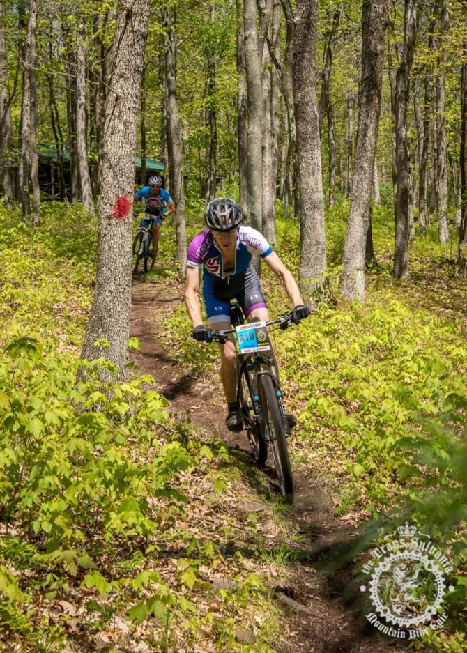 Chris Mattingly rolling the singletrack trail on a descent