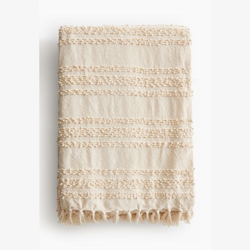 beige textured bedspread