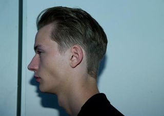 side profile of a male model