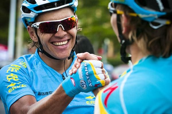Stage winner and new tour leader, Valentin Iglinskiy, is congratulated by Astana teammate and brother Maxim in Sanya.