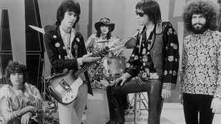 Steppenwolf in a studio setting, with guitarist Michael Monarch holding his guitar