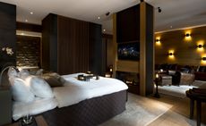 The Chedi Andermatt with bedroom and living space