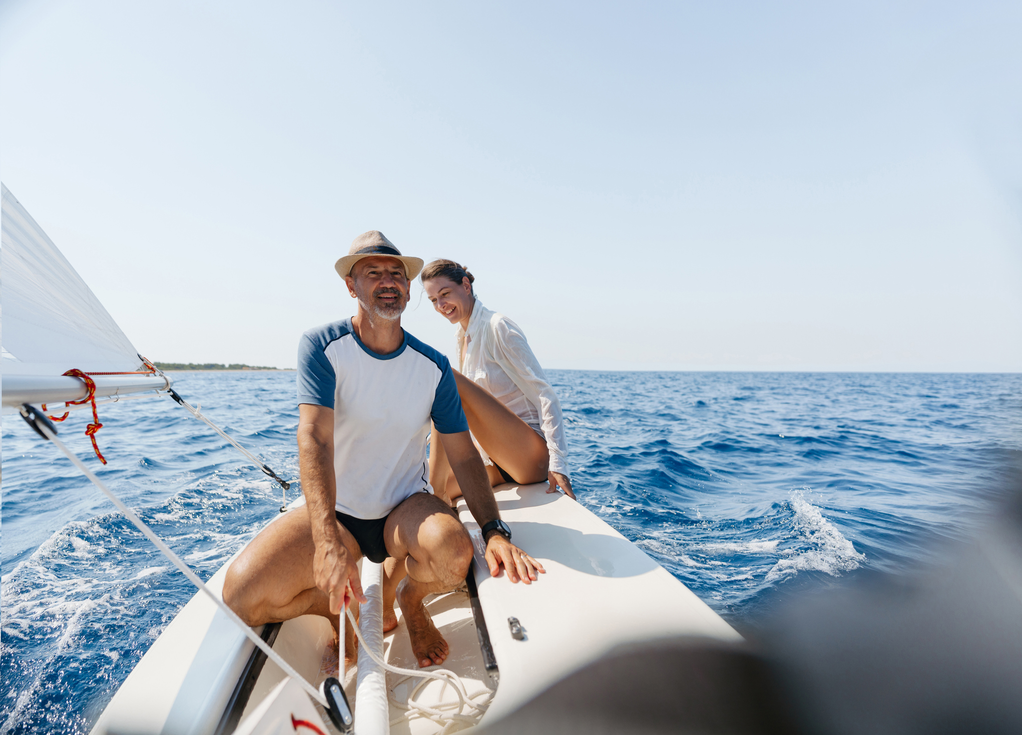 Retired couple sailing 