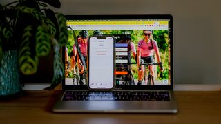Strava home screen on iphone and laptop
