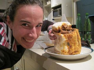 Sampling a local South African delicacy: Bunny chow put curry in a loaf of bread