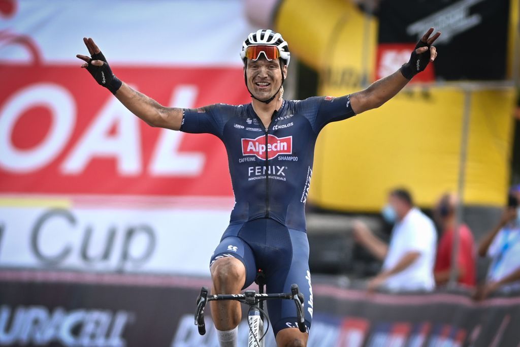 Belgian Jonas Rickaert of AlpecinFenix celebrates as he crosses the finish line to win the Dwars Door Het Hageland one day cycling race 187km from Aarschot to Diest on August 15 2020 Photo by DAVID STOCKMAN BELGA AFP Belgium OUT Photo by DAVID STOCKMANBELGAAFP via Getty Images
