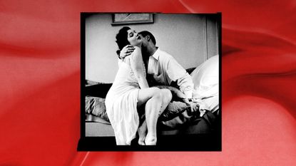 heterosexual couple kissing with red background 