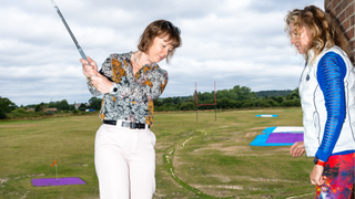 Women learning to play golf whilst business networking at Iford