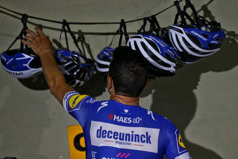Maximiliano Richeze (Deceuninck-QuickStep) reaches for his helmet before a training ride in San Juan