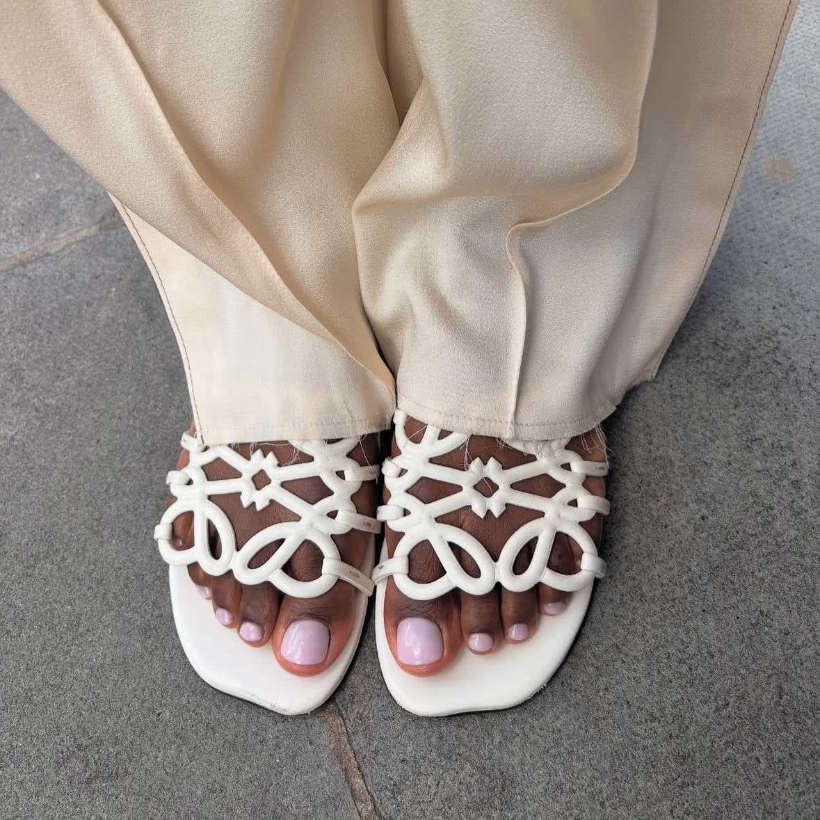 A milky lilac pedicure and Loewe sandals