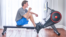 Man exercising on the Echelon Row-S rowing machine