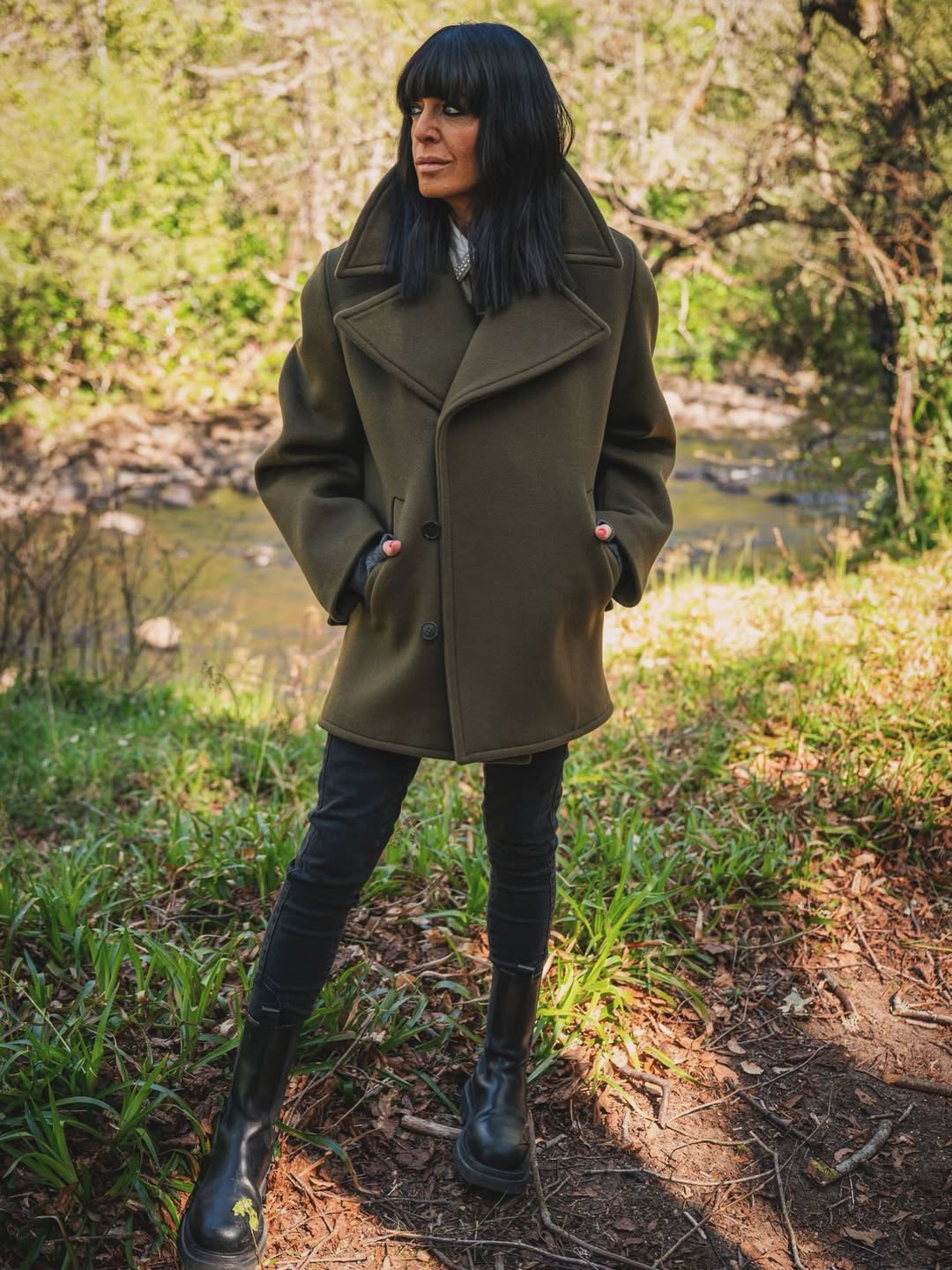 Claudia Winkleman wearing a green coat