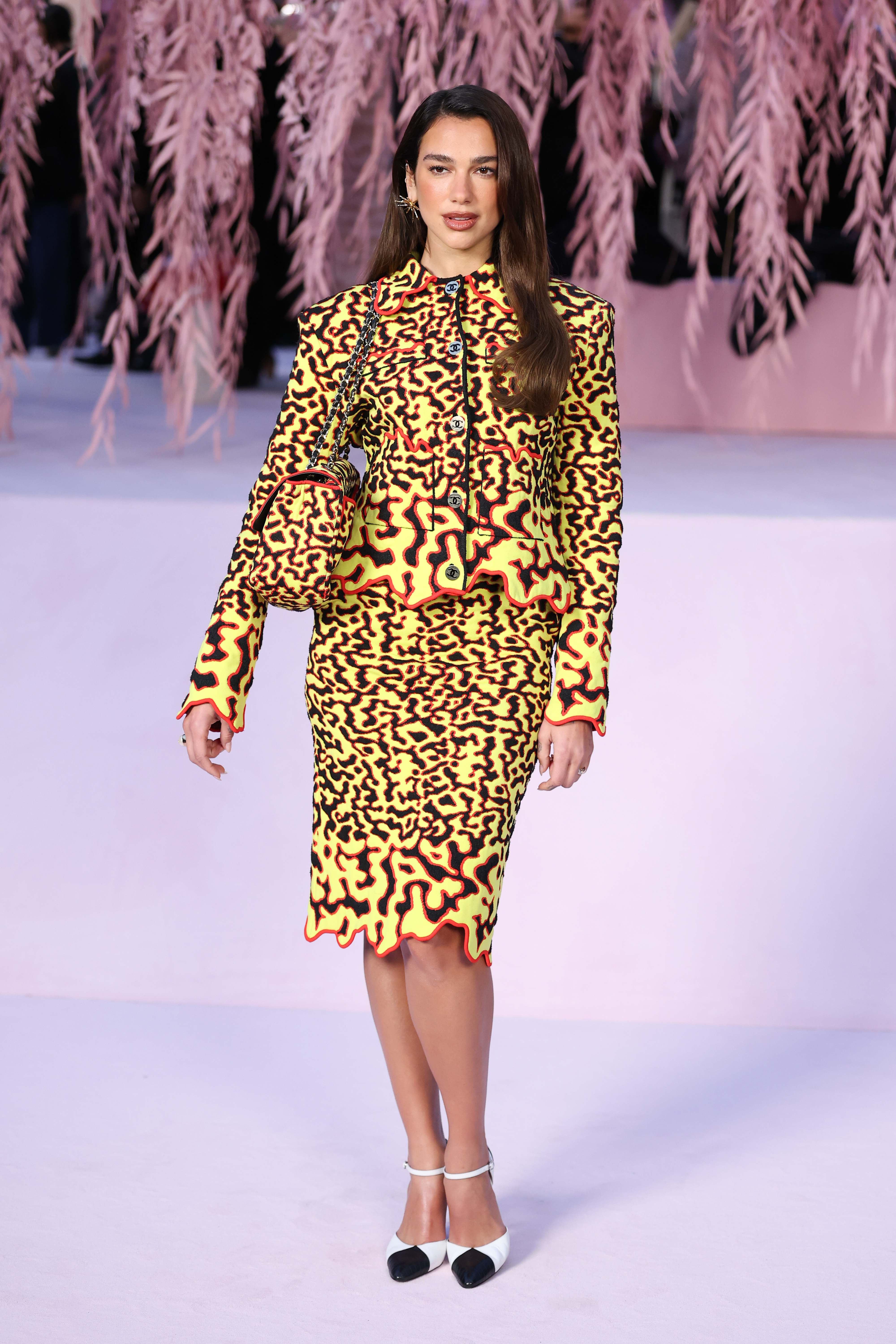 Dua Lipa styled Cardi B's fiery skirt set to the Chanel Couture fashion show