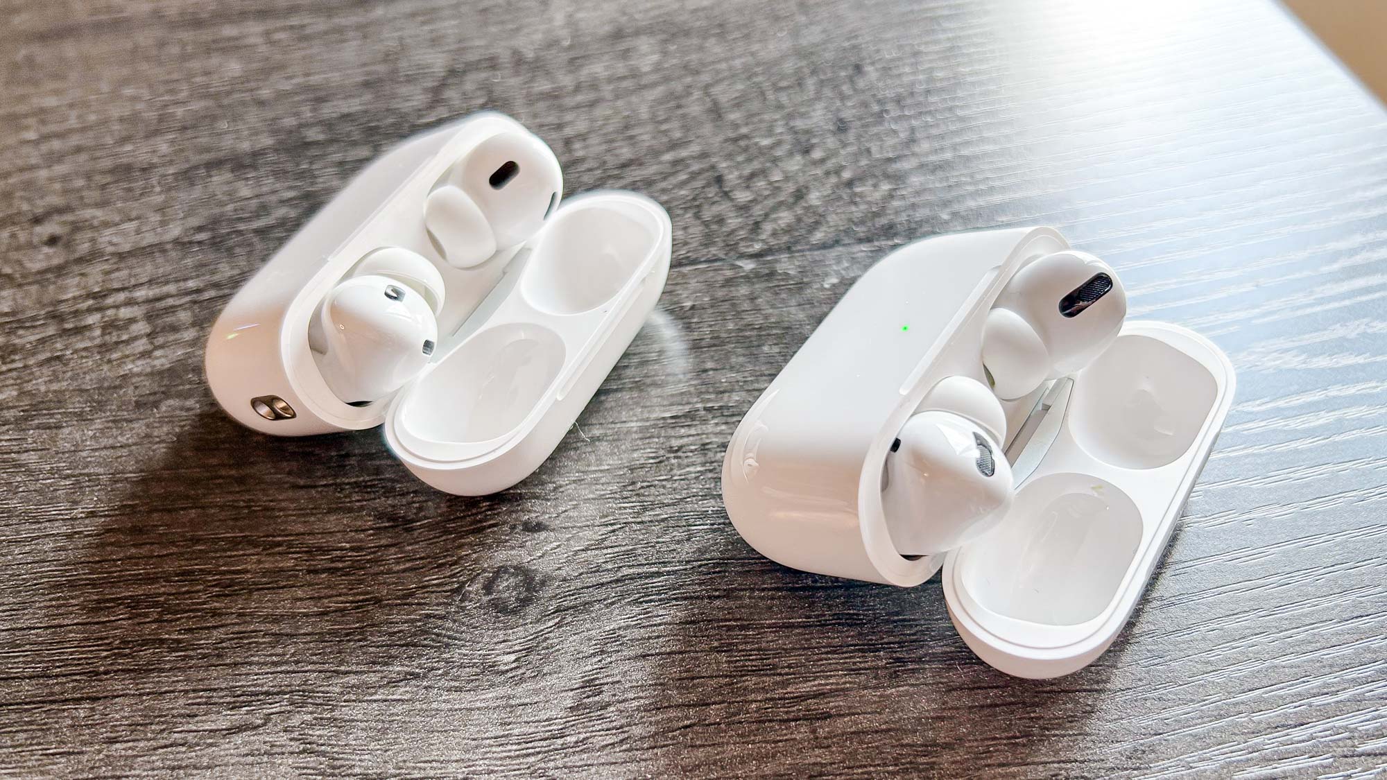 AirPods Pro (2nd Generation) shown next to the previous AirPods Pro (right)
