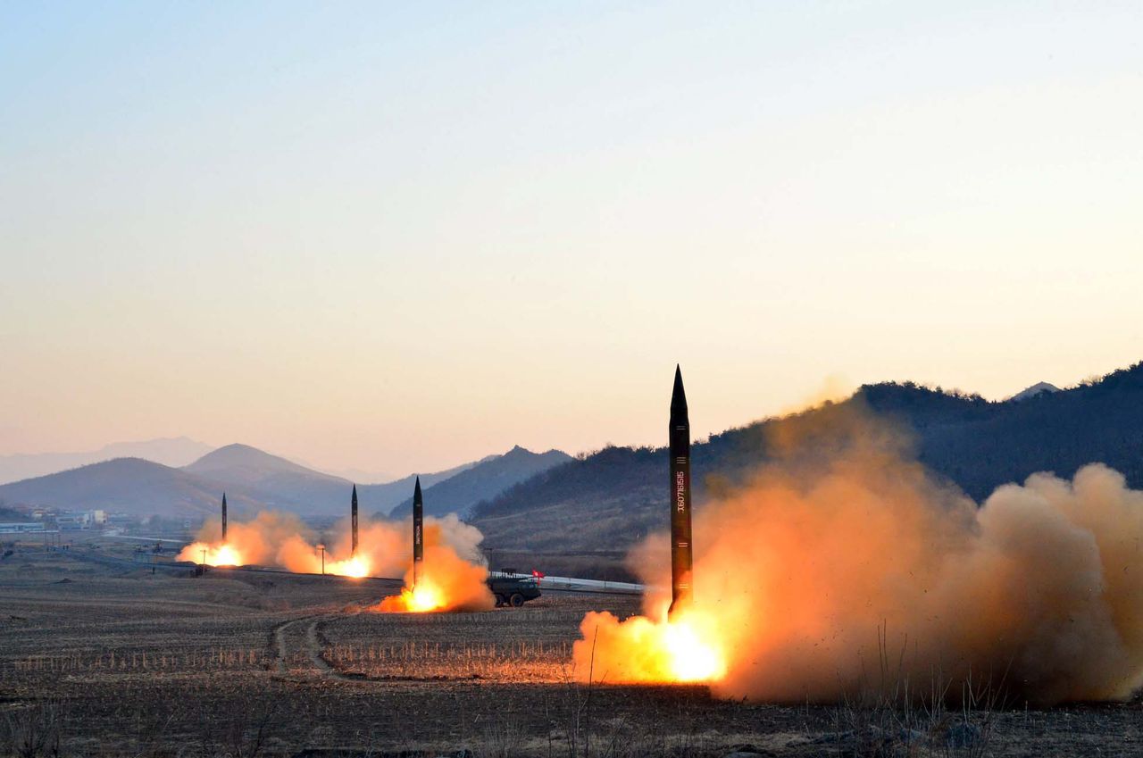 Four North Korean missiles launching.