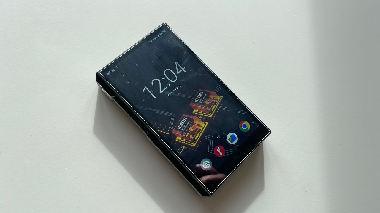 Fiio M11s on table, showing the lock screen