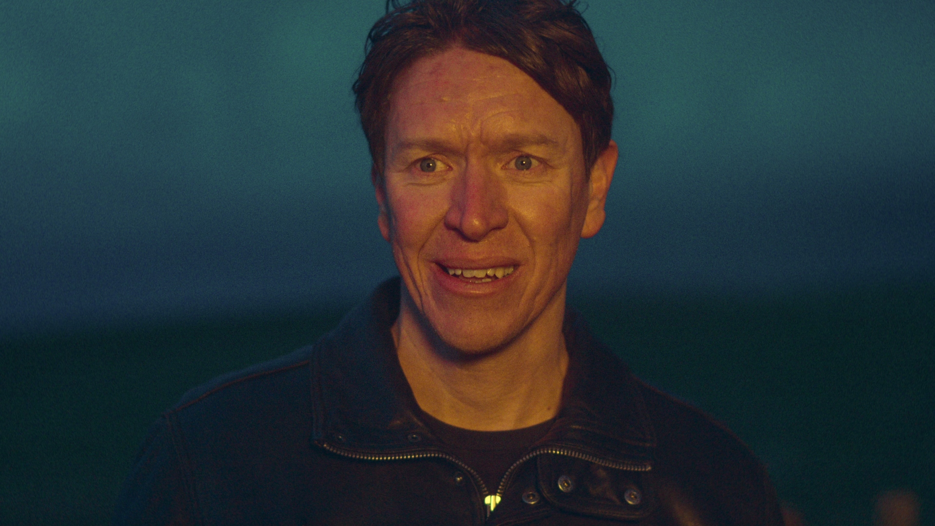 Charlie smiles in The Gold season 2