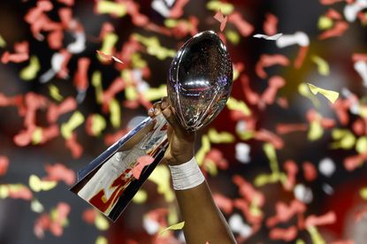 The Vince Lombardi Trophy is hoisted after Super Bowl LVII