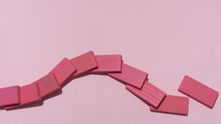 pink fallen dominos