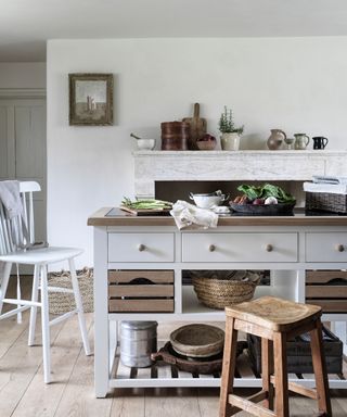 White farmhouse kitchen with a freestanding Chester island from Cotswold Company